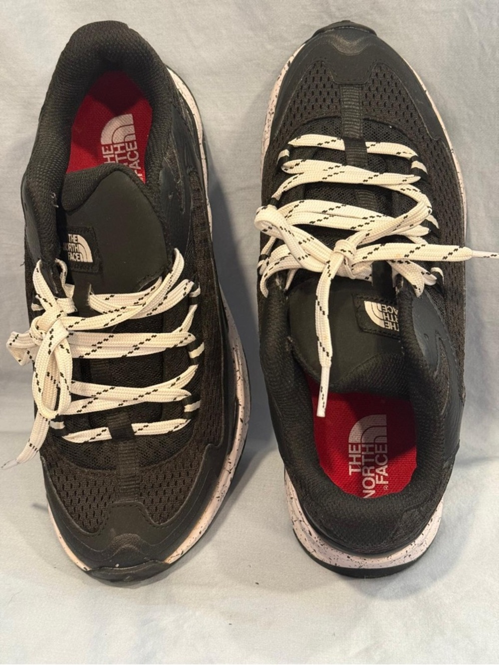 The North Face Women’s Black Sneakers with White Laces and Red Insole